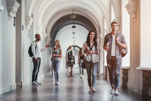 Students in a corridor of a college