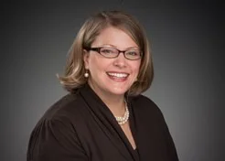 Amyjungeheadshot_2023