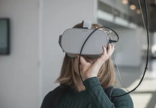 A girl experiencing VR