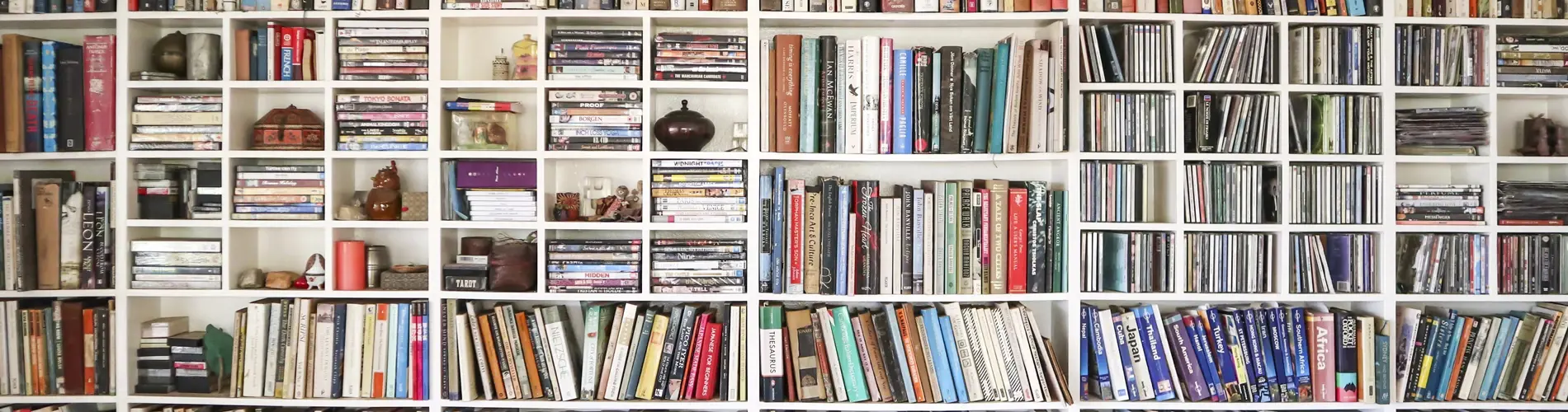 White Library Shelves of many books