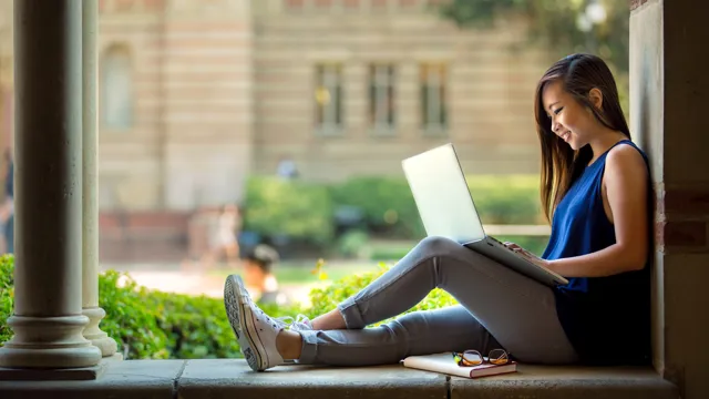 Student Smiling Studying Outdoors