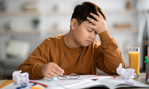 A student feeling stressed over homework