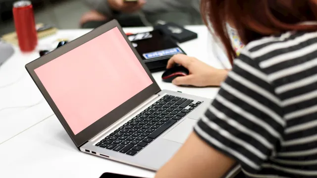Girl Striped Shirt Working On Laptop