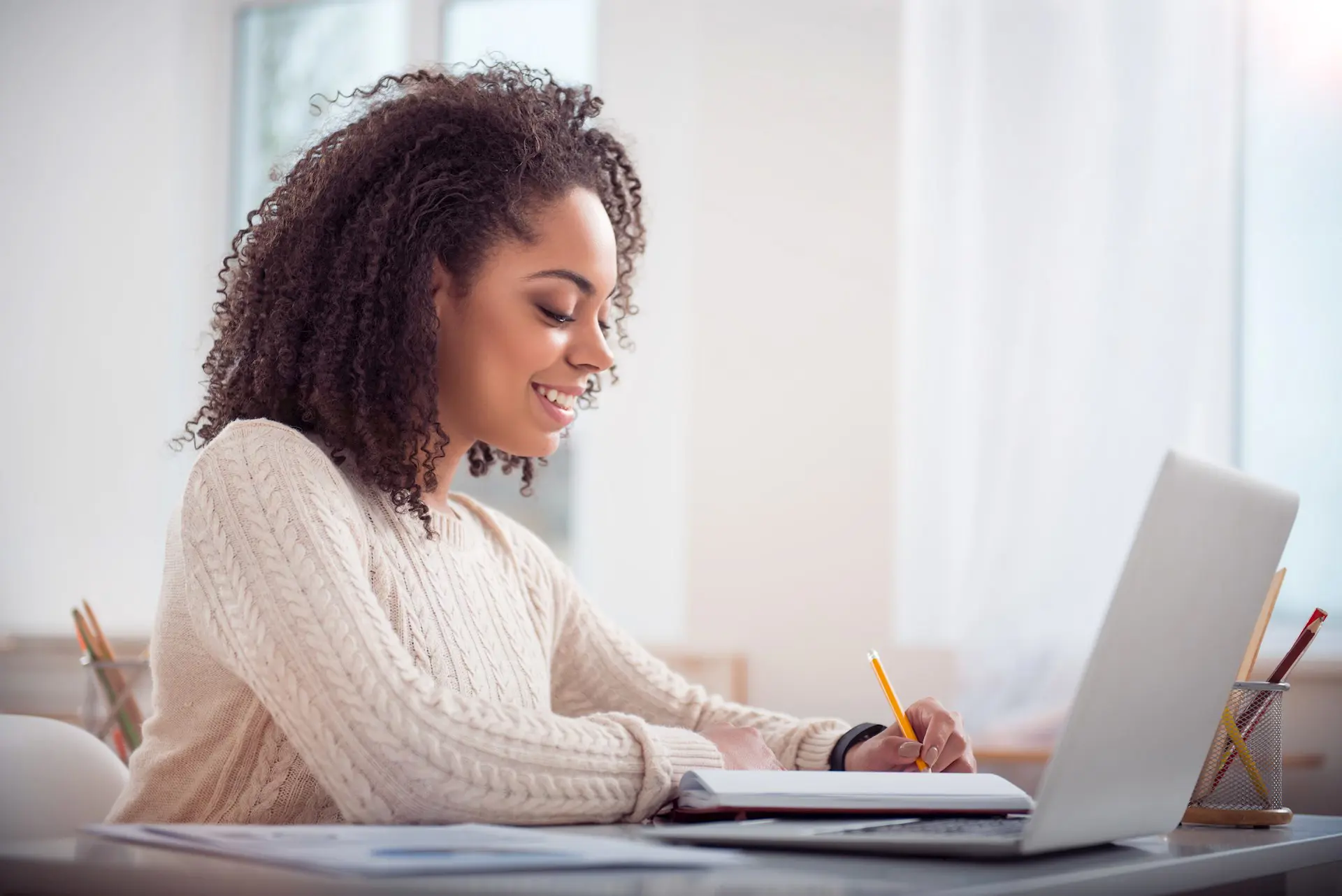 Smiling Student Studying Laptop
