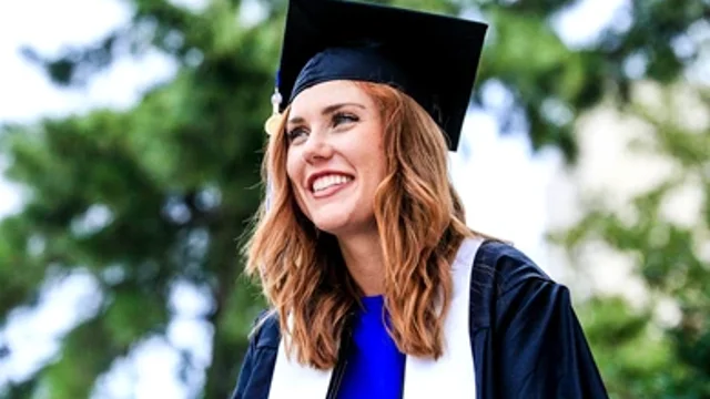 Girlsmilingwithgradcapon_2023