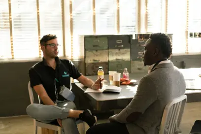 two men chatting NSHSS