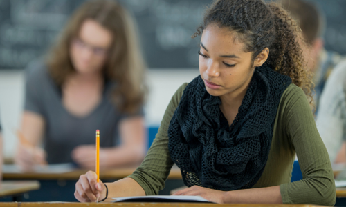 Girl writing an exam