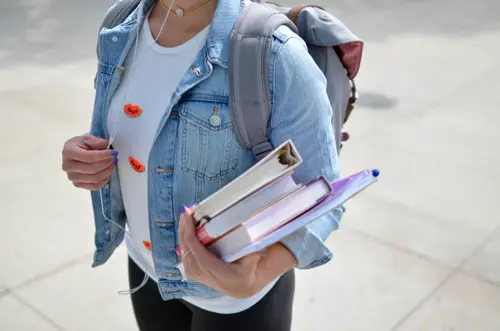 A College Kid with Study Books