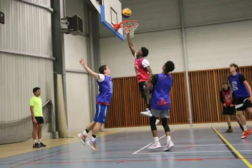 Students playing basketball